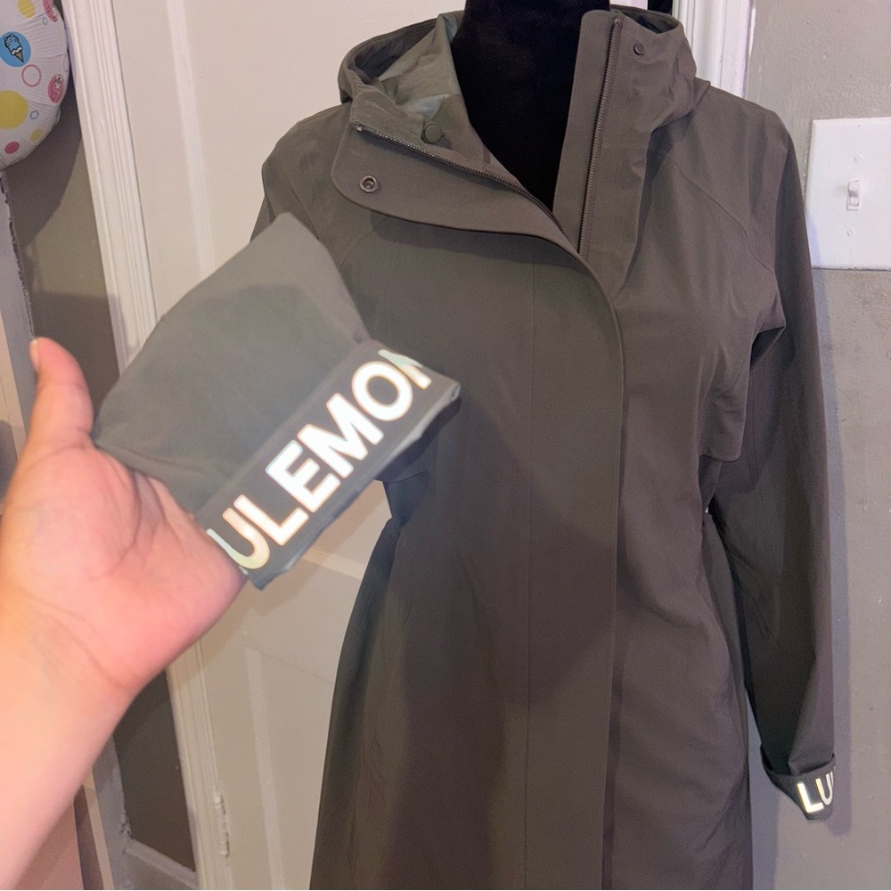 lululemon rain rebel jacket in medium olive reflective logo